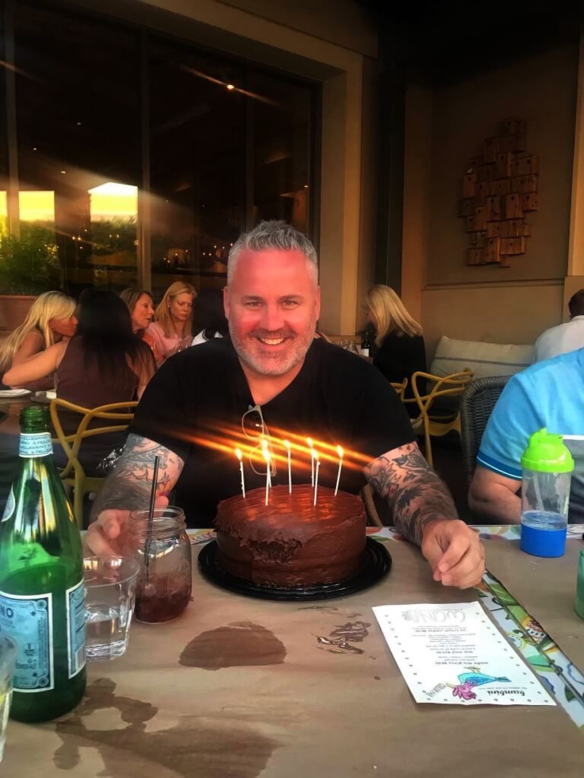 Travis Avery smiling during a family celebration