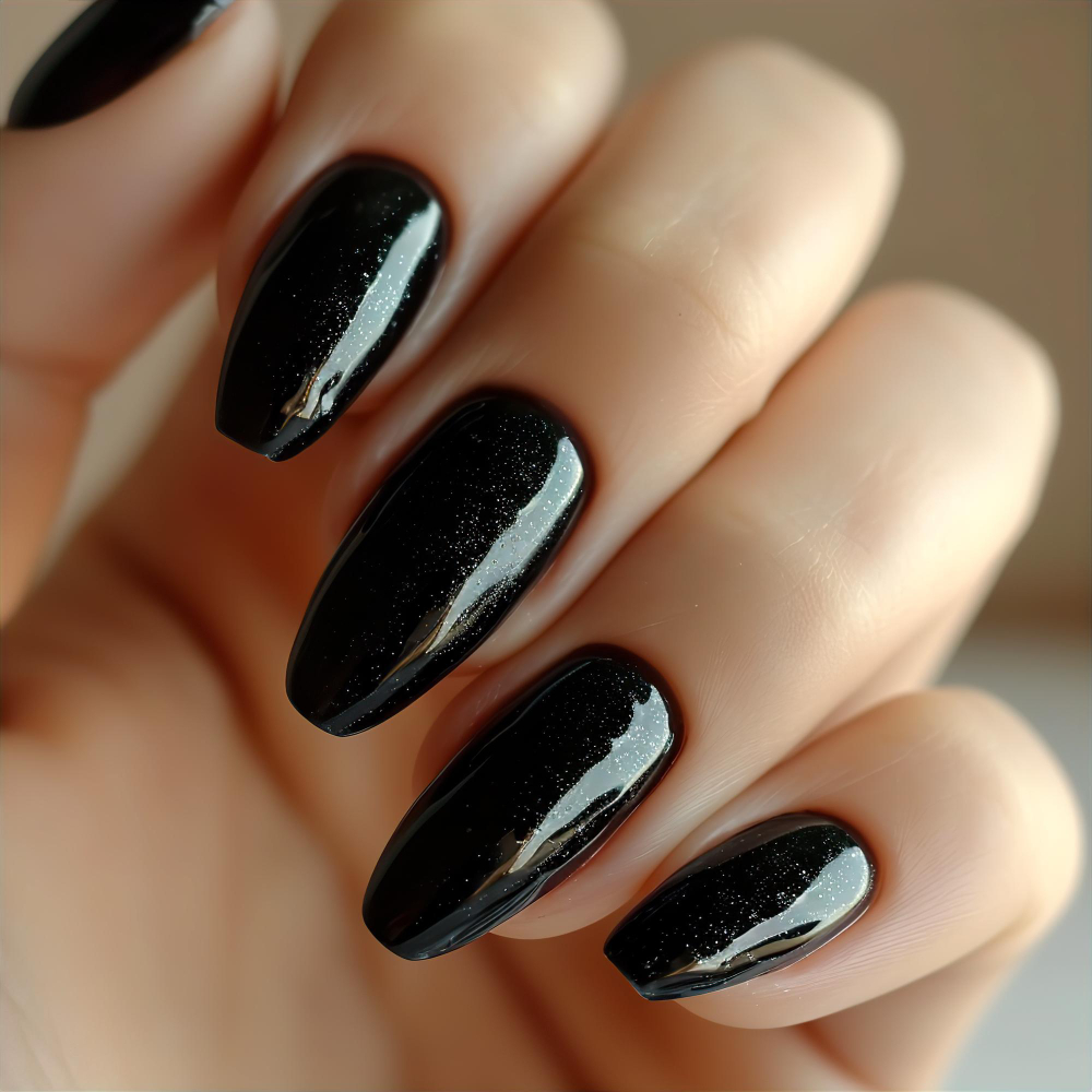 Long glossy black nails with a subtle shimmer.